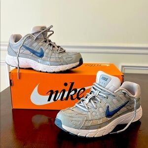 Nike P6000 Kids shoes size 5.5Y. Very good condition. Worn a handful of times .